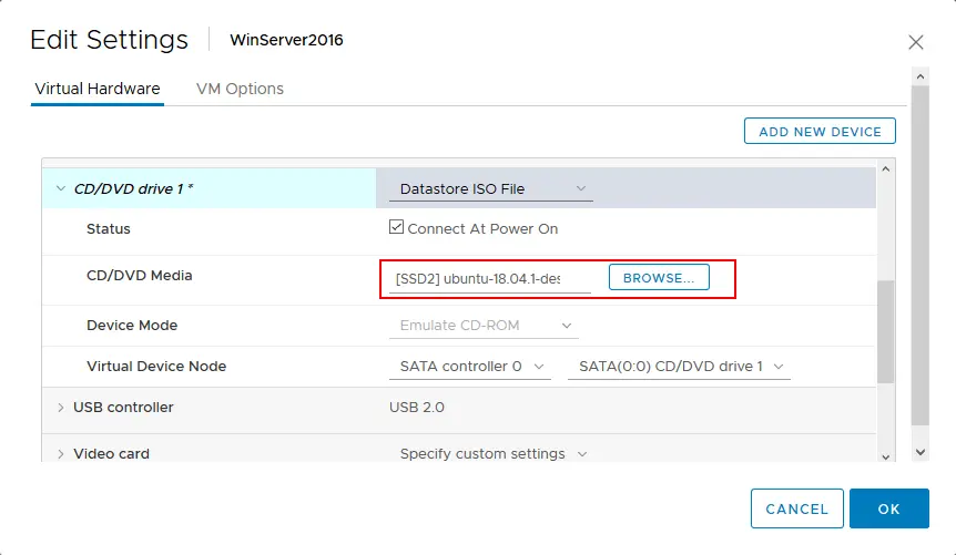 Inserting a bootable ISO image into a virtual optical drive to boot from DVD and access the contents of the VMDK file