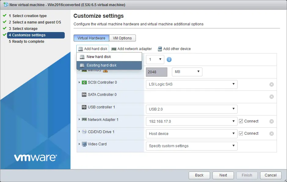 Importing a virtual disk converted from VHD to VMDK to a VM on ESXi.